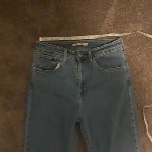 721 high rise  skinny Levi’s with frayed hem